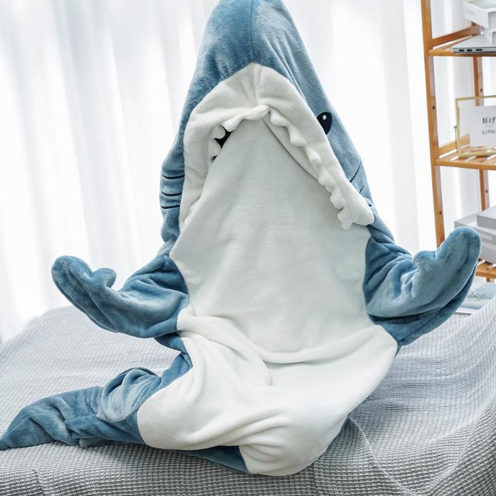 #7 Cozy Shark Snuggle Pajamas for kids and adults. (*editors note- Silly and Comfy. As seen trendy everywhere.)